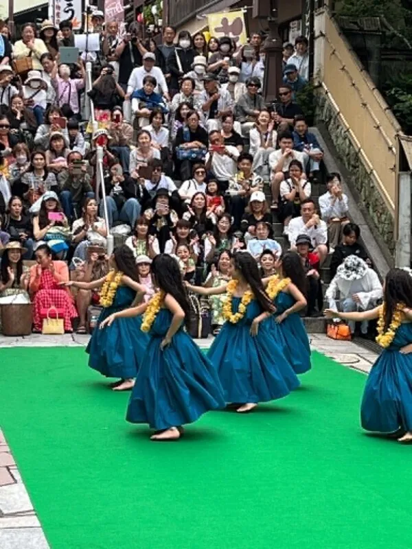 Guests watch hula on the Stone Steps