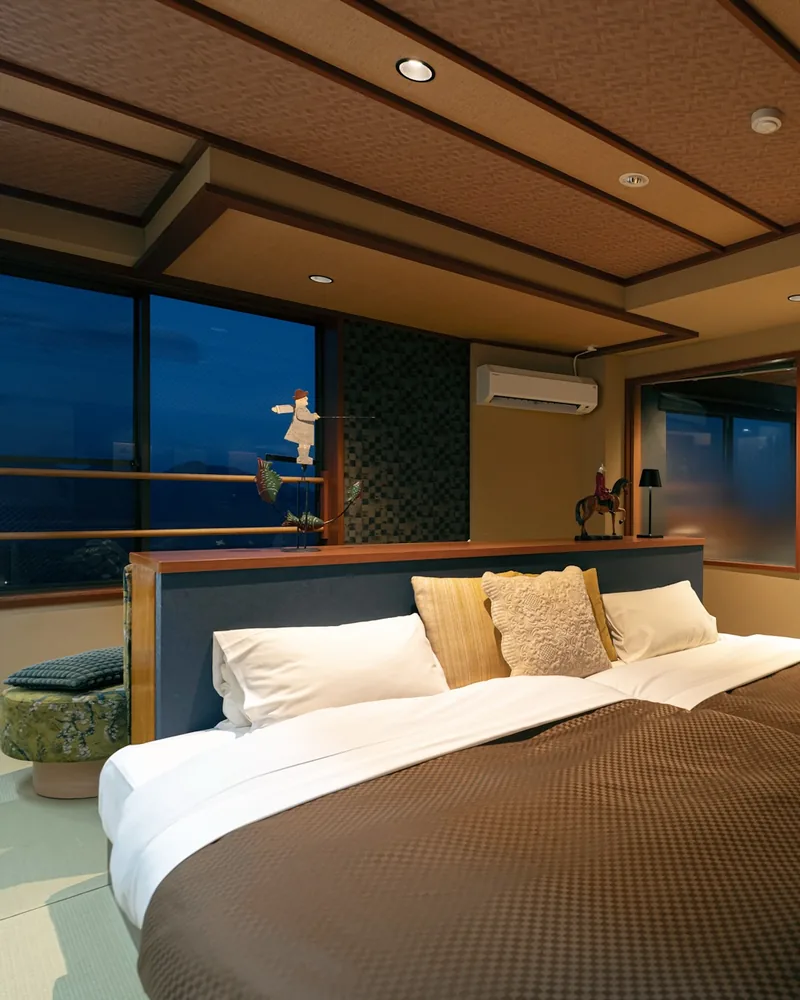 The renovated twin room at night