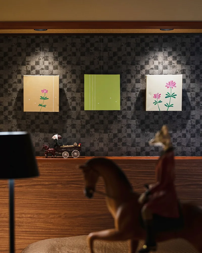 Wall panels and a horse figure on the counter