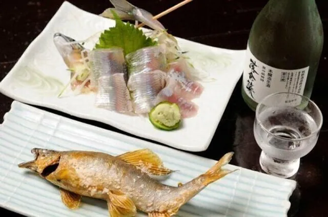Ayu cooking at Ochiai Yana