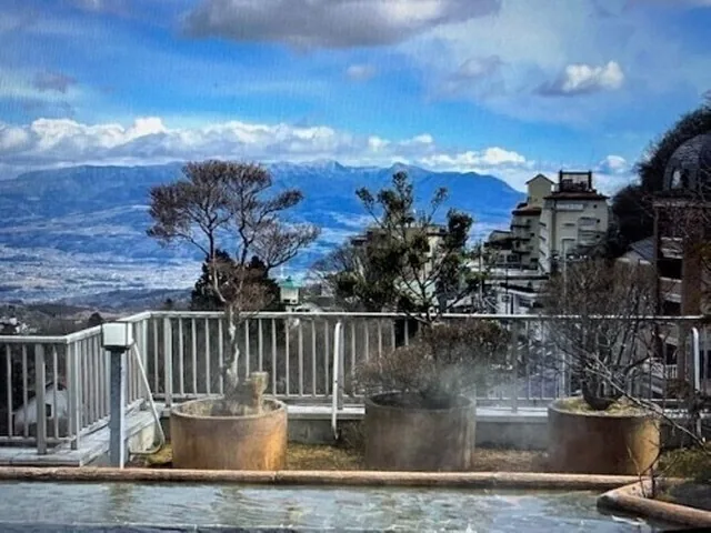 The rooftop open-air bath and a winter mountain view